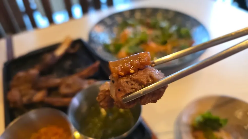 Lamb topped with salted octopus combination