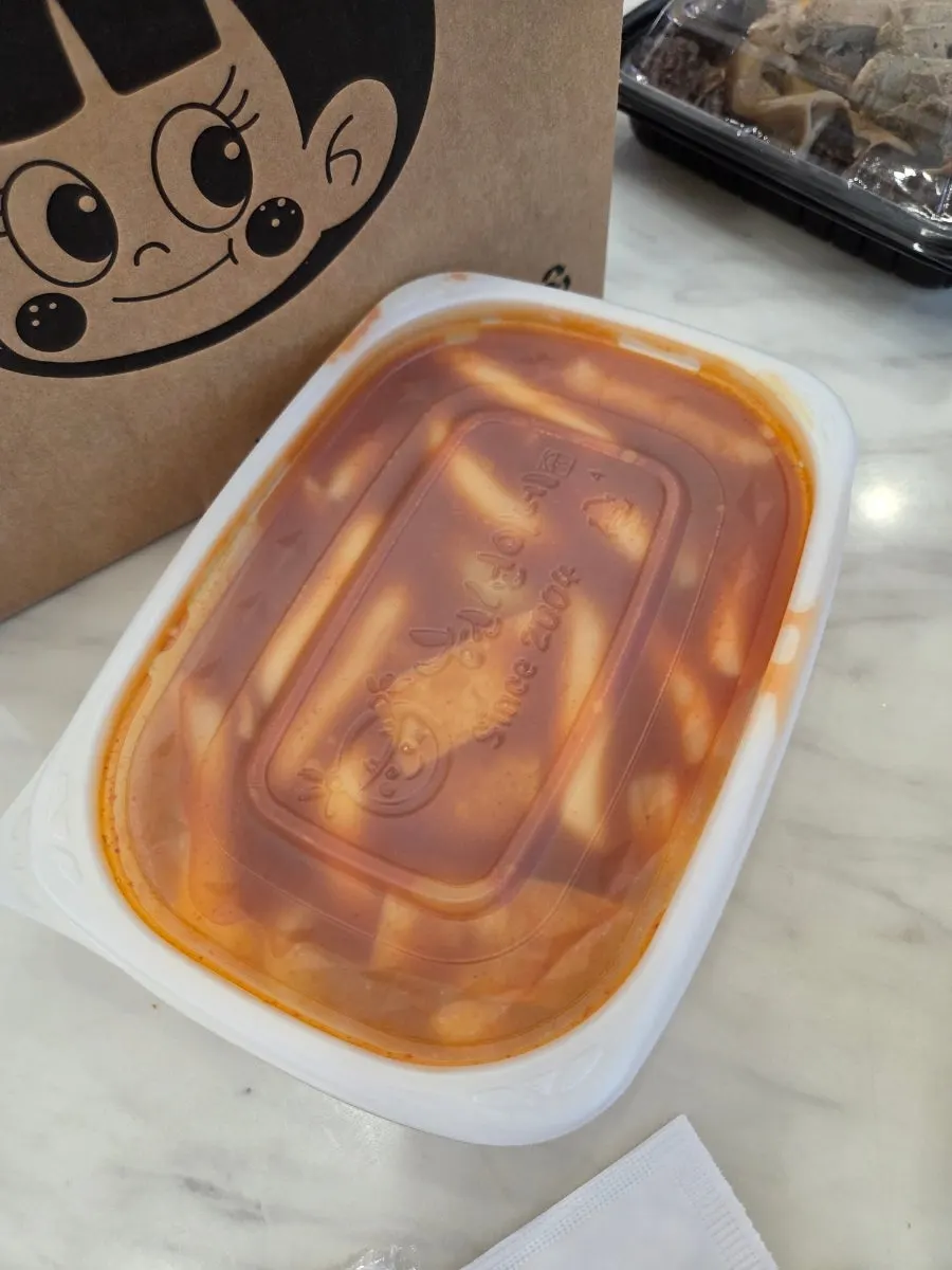 Tteokbokki sealed in a dedicated container for takeout
