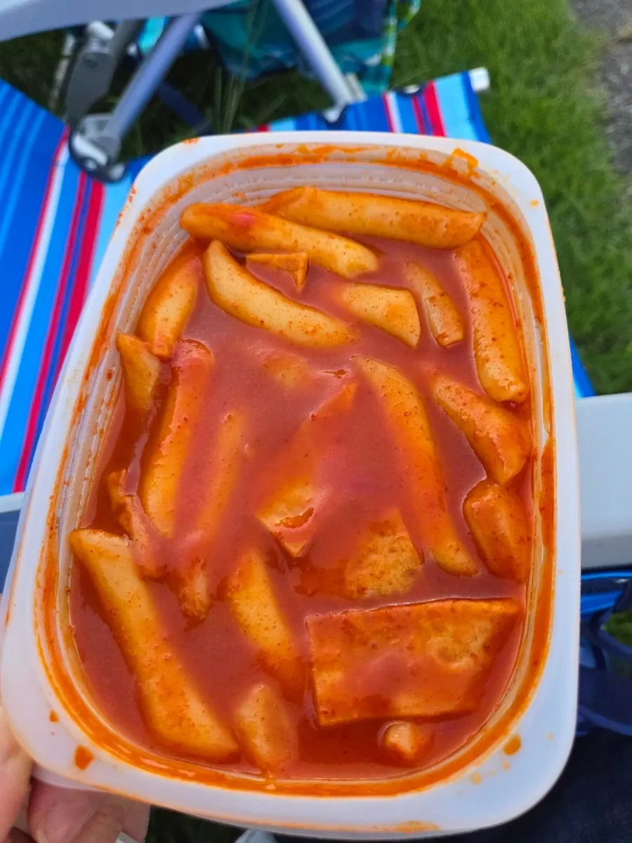 Korean snack spread in Yeouido Park with a cider added