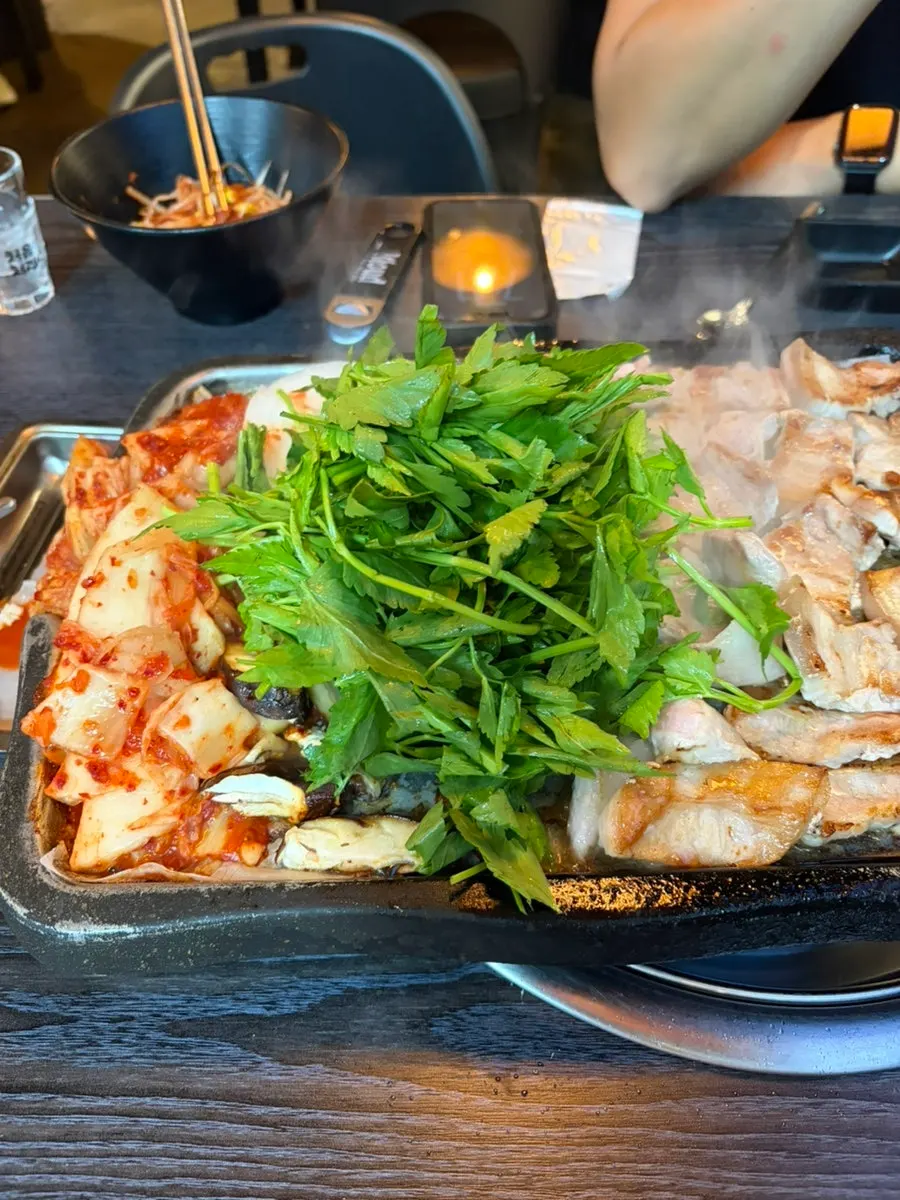 Combination of grilled scallops and meat