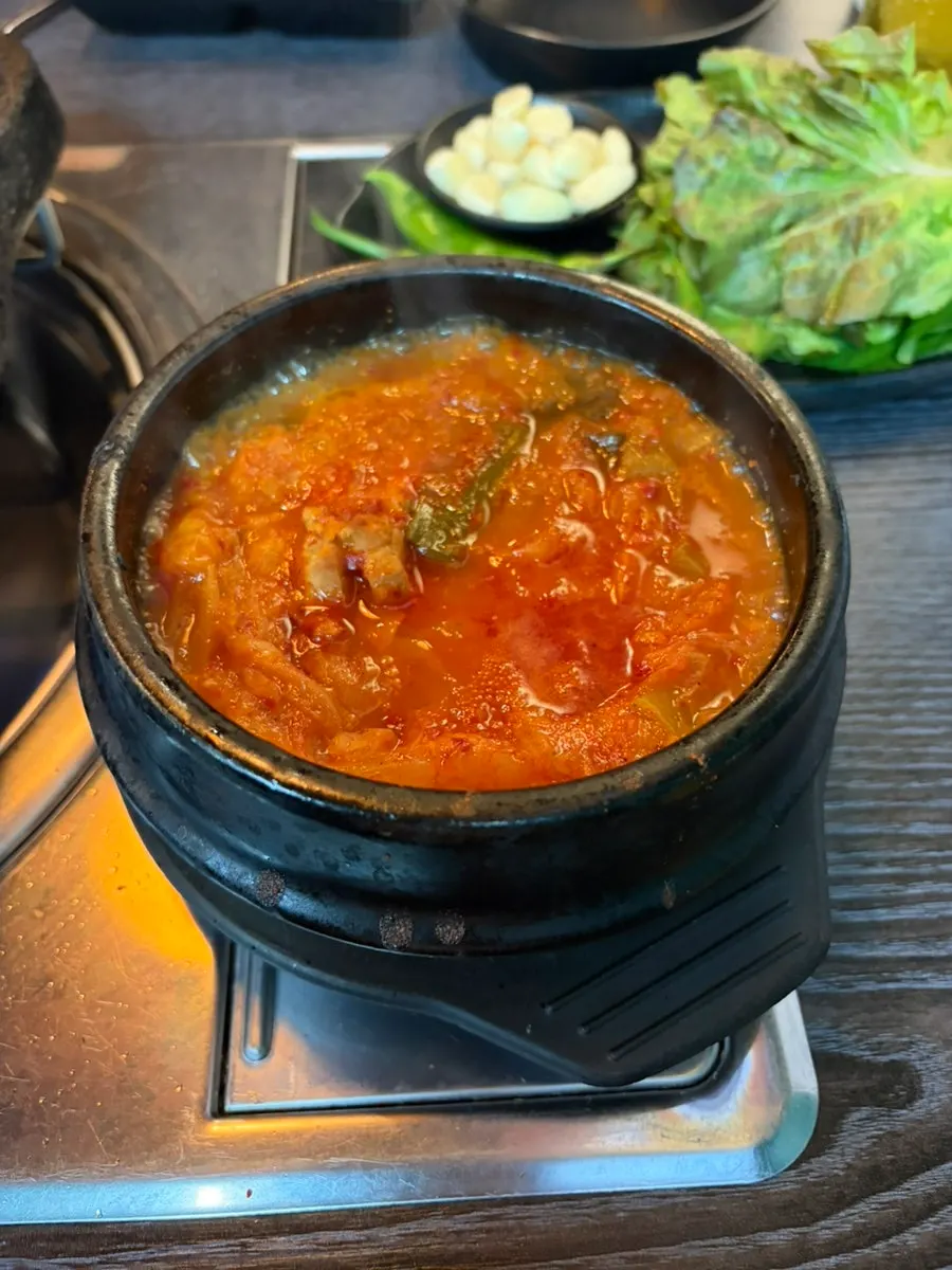 Pork belly with minari and grilled kimchi