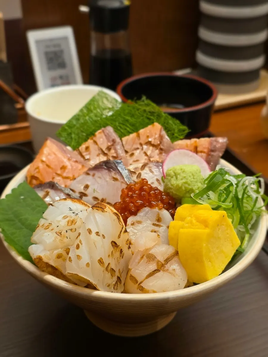 Abrudon topped with lightly seared ingredients