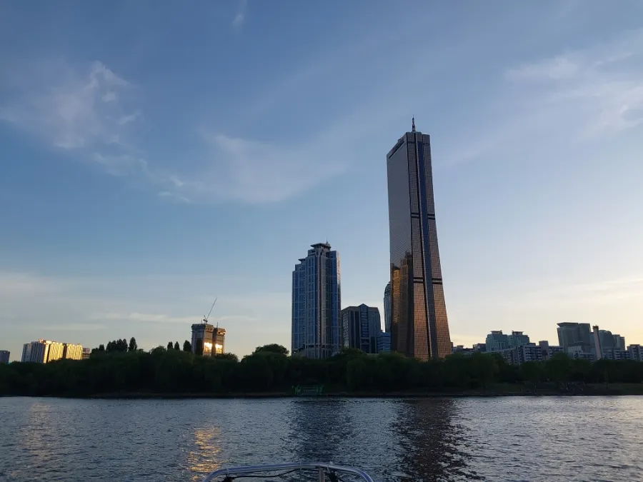 Han River sunset and yacht deck lights
