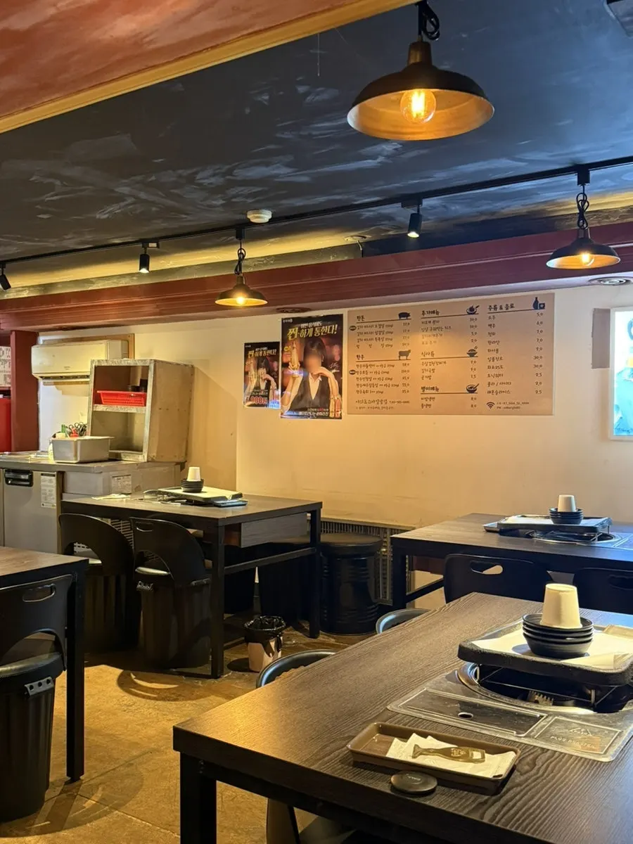 Neatly set table and grill at the BBQ restaurant