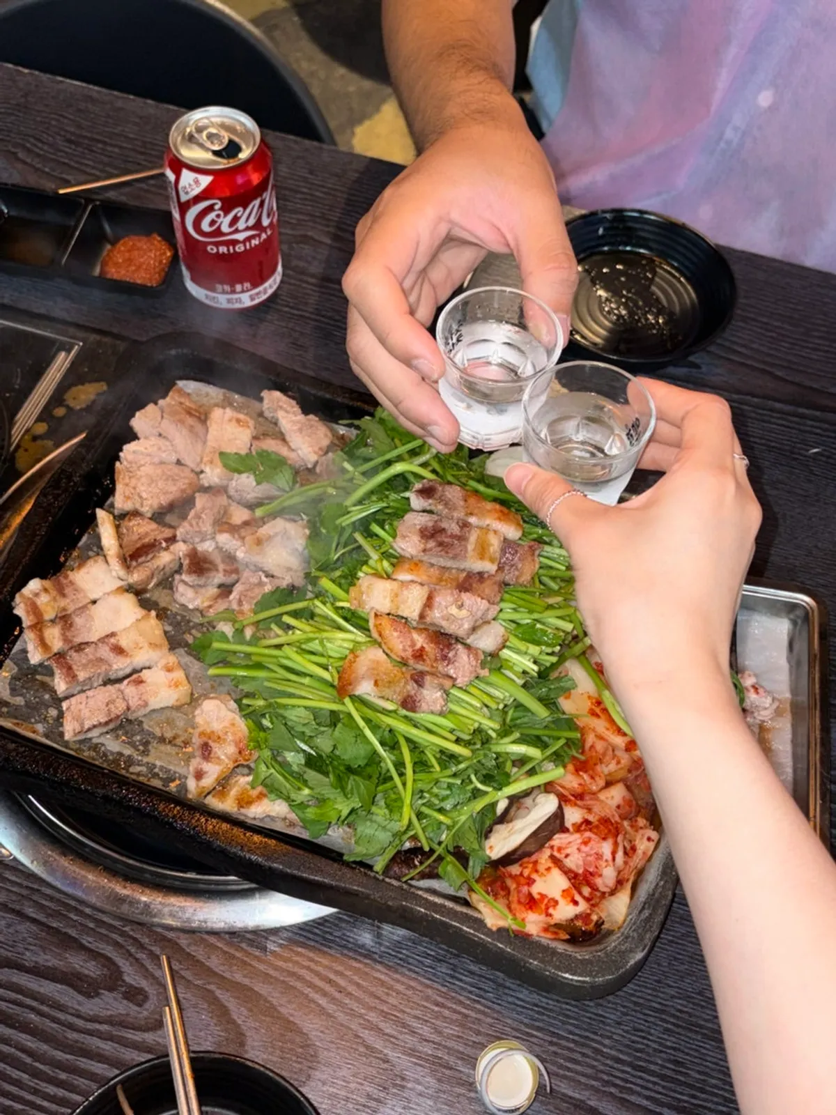 Icy soju next to the minari pork belly grill