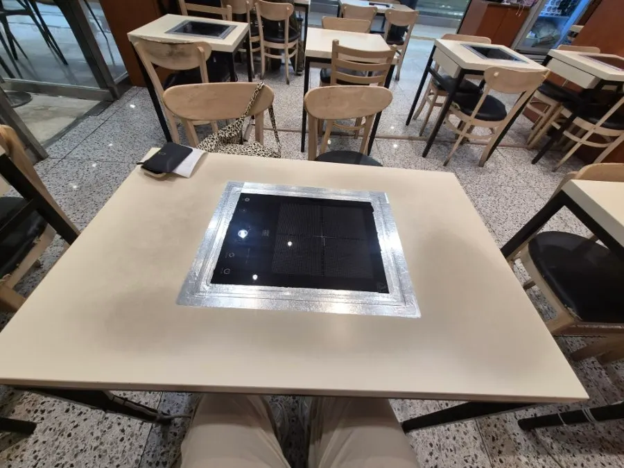 Made-to-order tteokbokki table with an induction burner