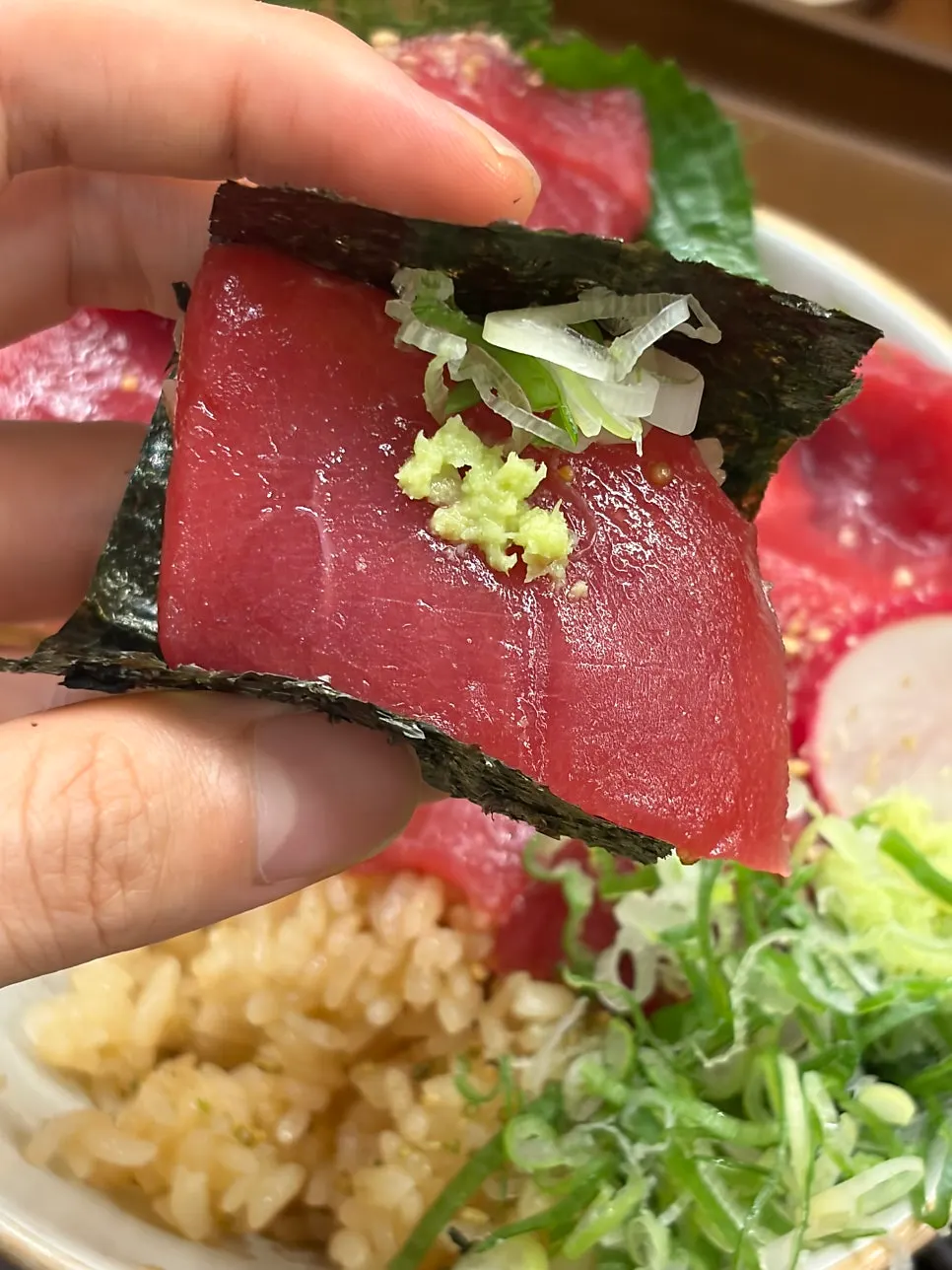 Tuna topped with chives and fresh wasabi