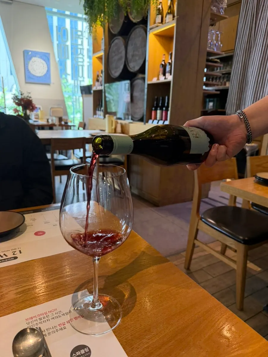 Pinot Noir red wine poured into a glass
