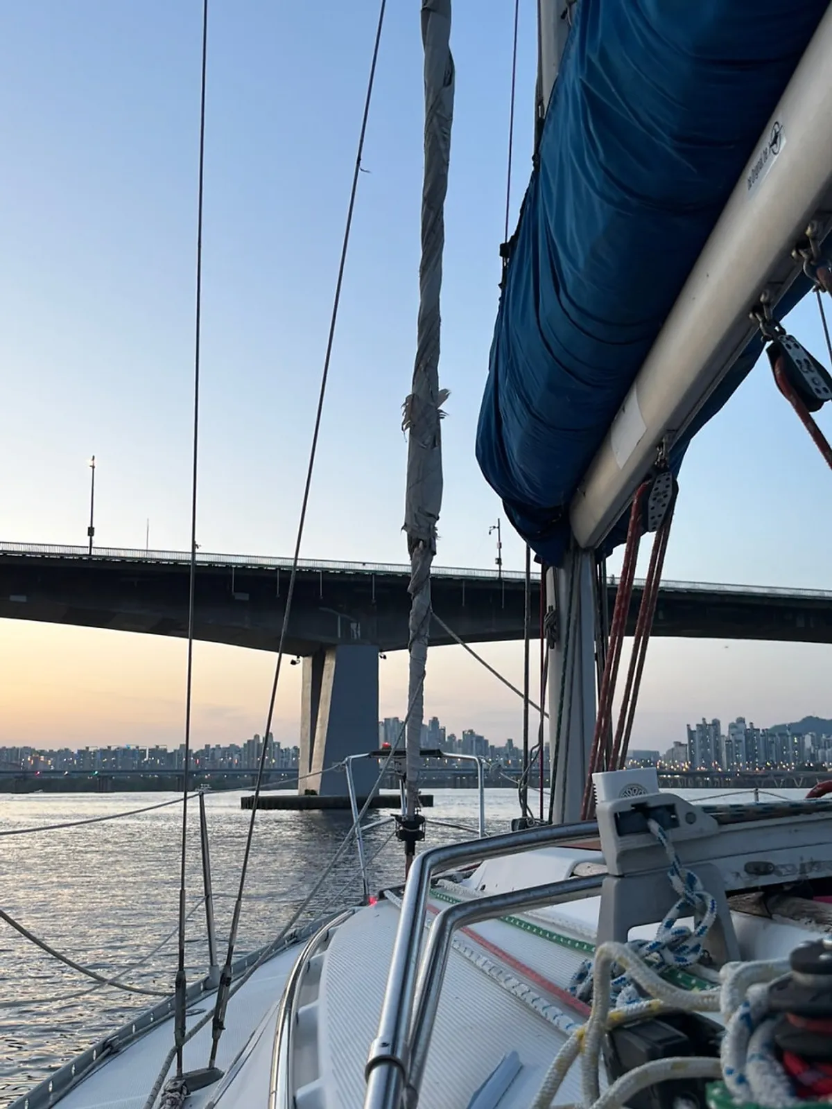 Sailing yacht cruising with its sail unfurled