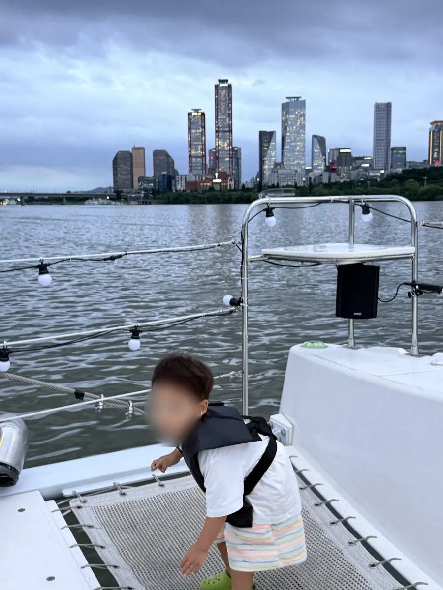 Enjoying the Han River breeze on a yacht tour