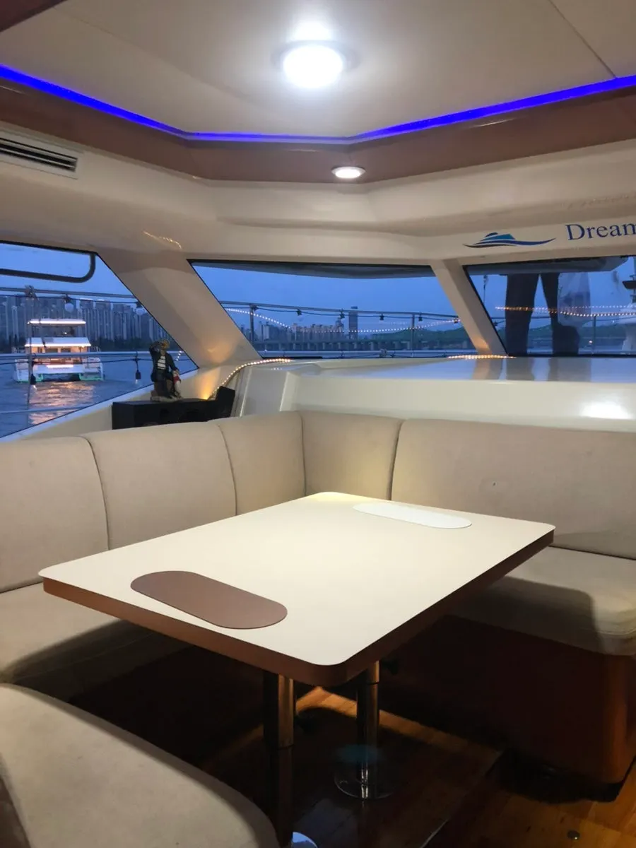 Table area inside the yacht's first floor