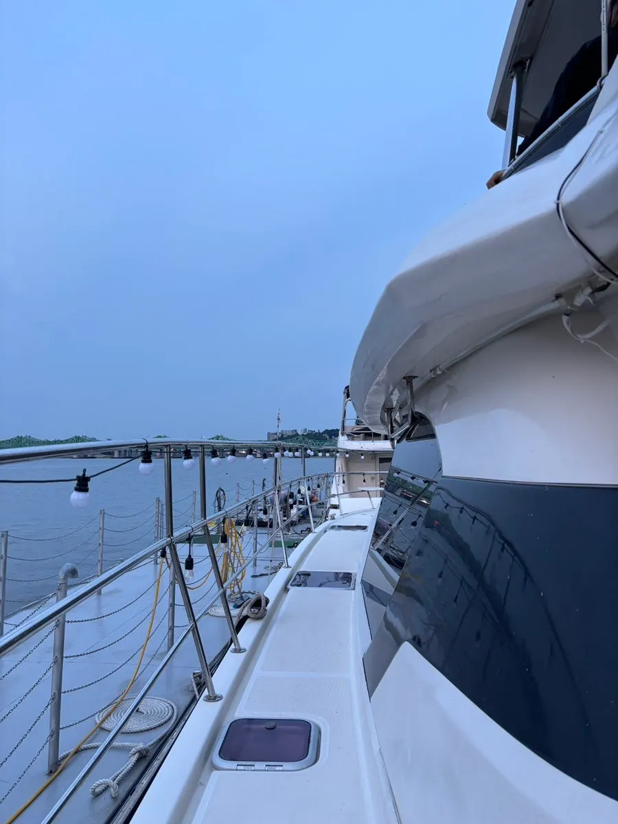 Passengers viewing Han River scenery from the yacht's second floor