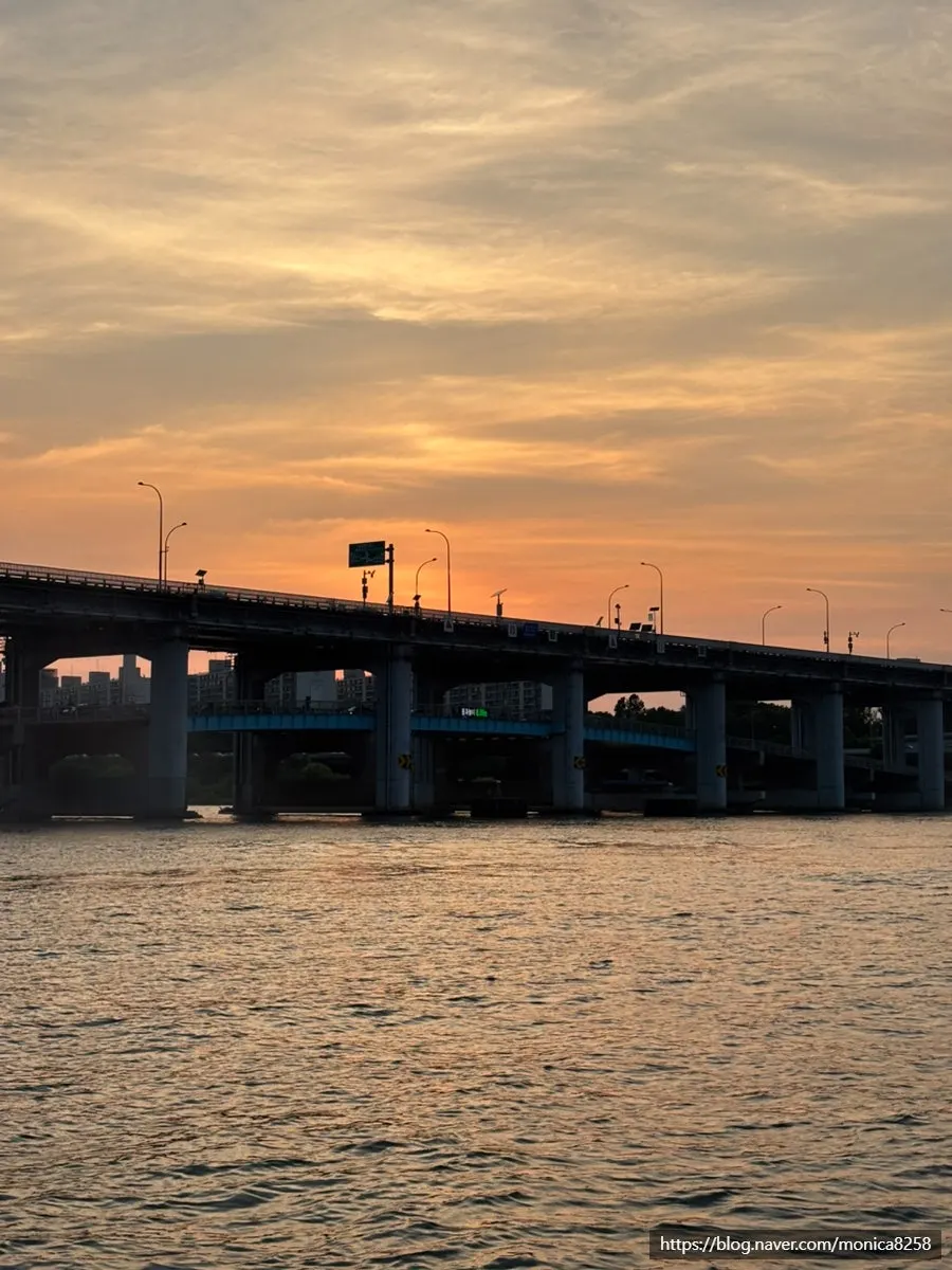 Han River yacht against a sunset backdrop