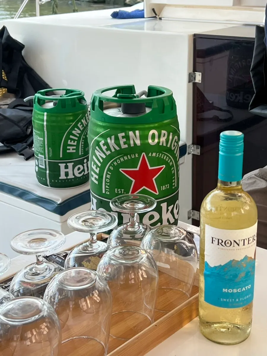 Glasses and ham-flavored crackers prepared on the yacht