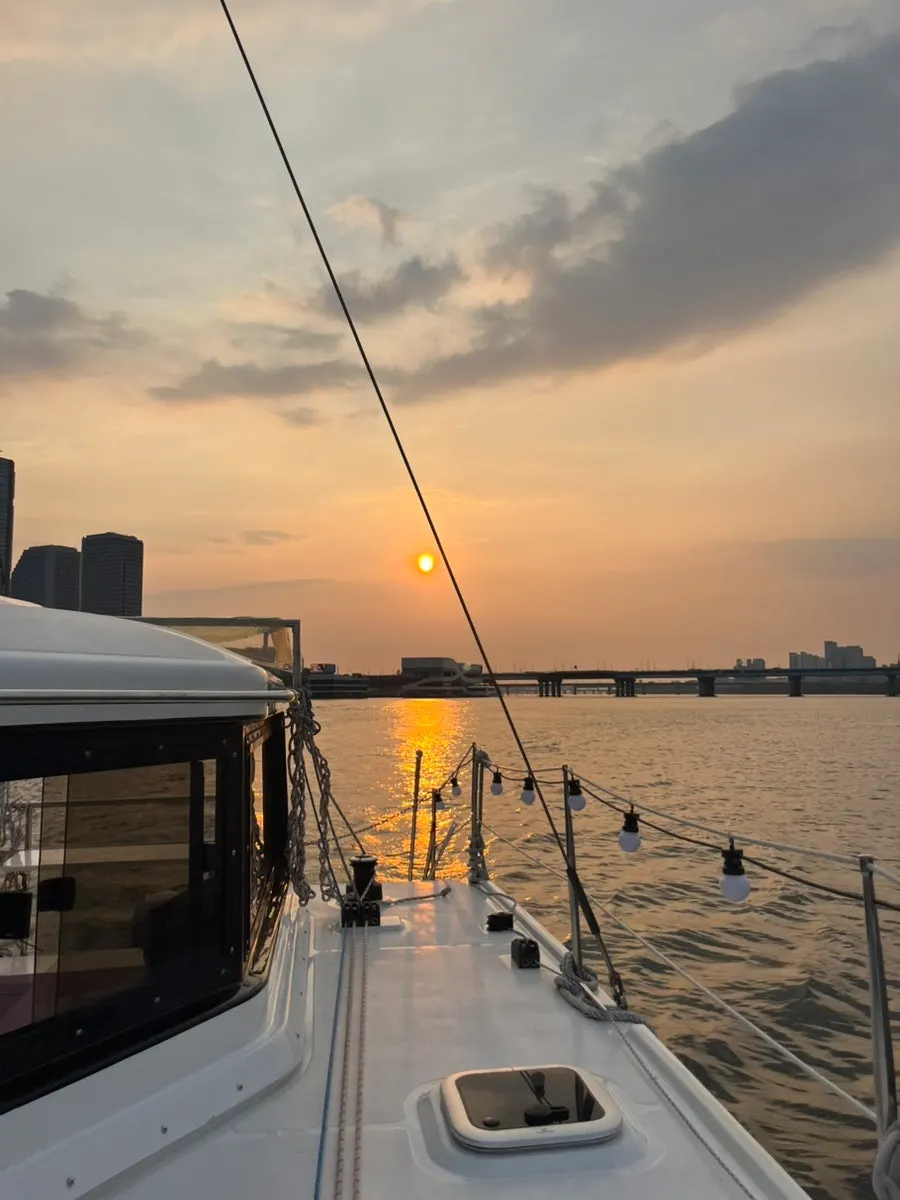 My sibling on the yacht at sunset
