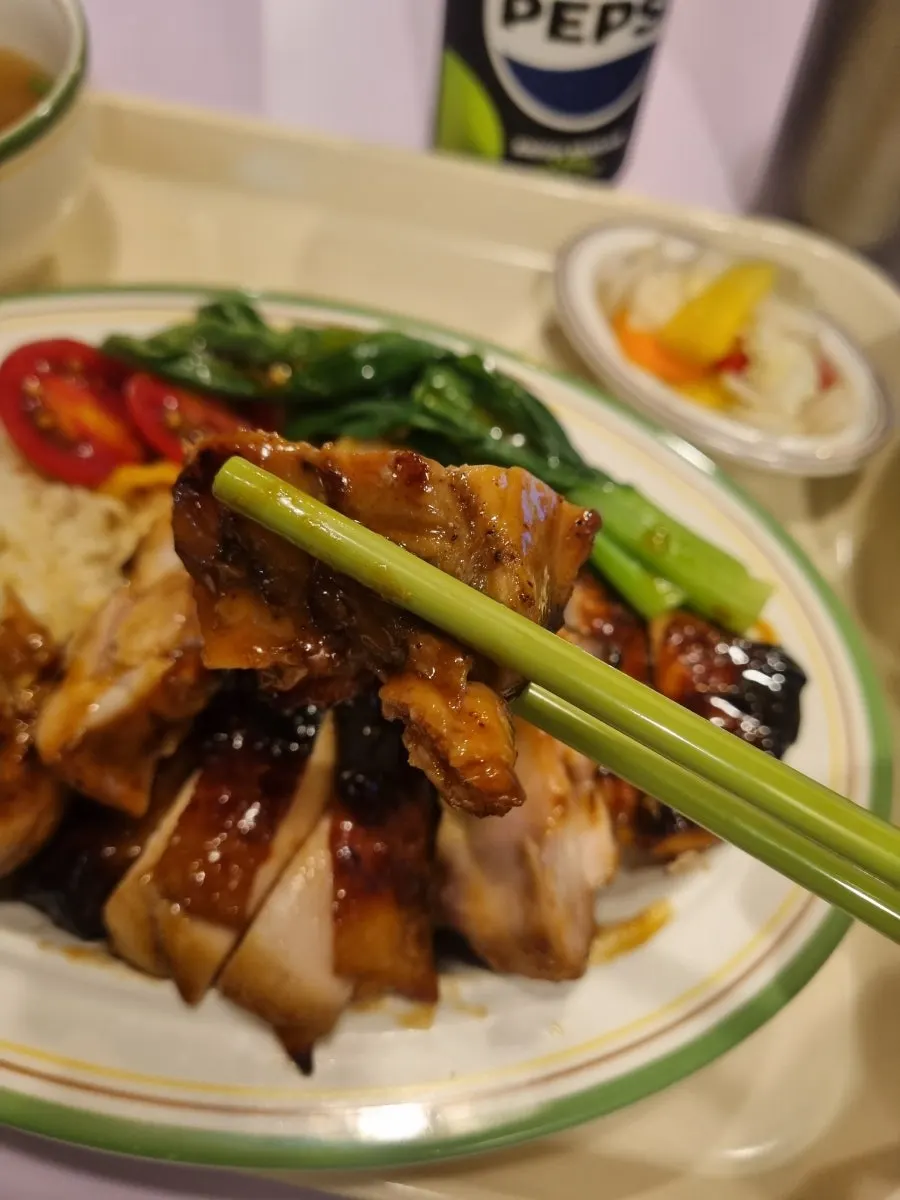Chicken rice served with chicken soup