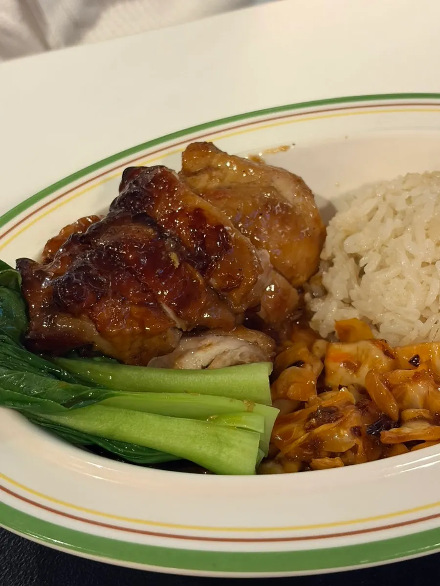 Char siu chicken rice with sauce-coated meat and vegetables