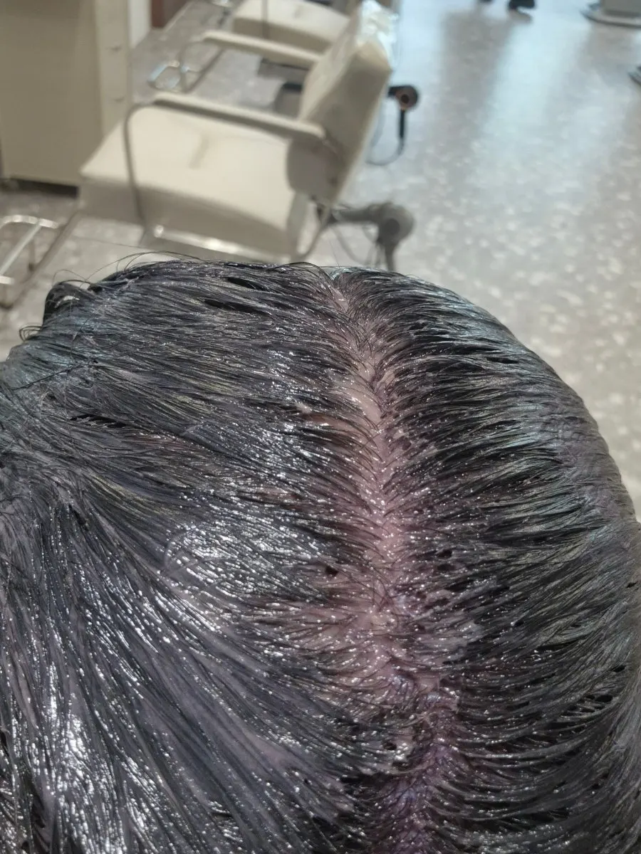 Hair with dye applied after scalp protector treatment