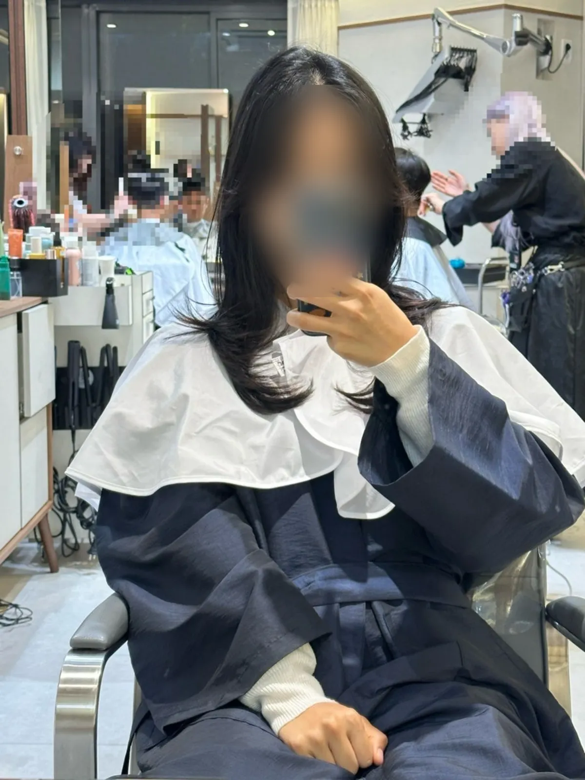 The writer's finished hairstyle after the magic setting perm