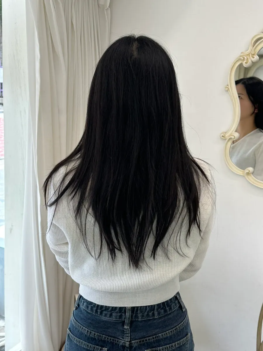Hair before treatment showing the parting drifted back
