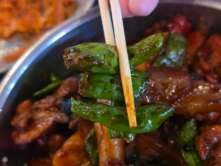 Dakbokkeum topped with shishito peppers