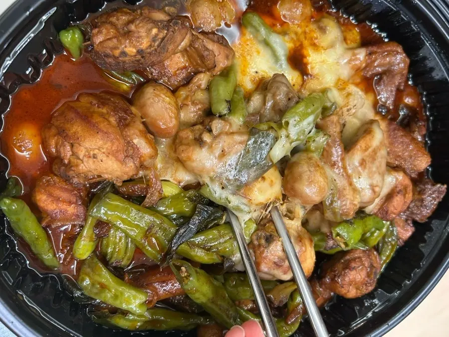 Reheated takeout shishito pepper chicken stir-fry
