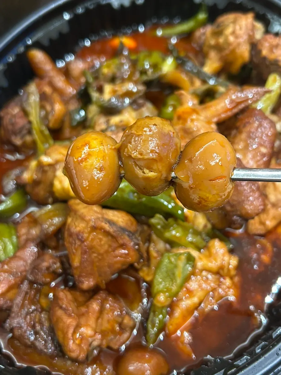 Chicken with cheese and shishito peppers
