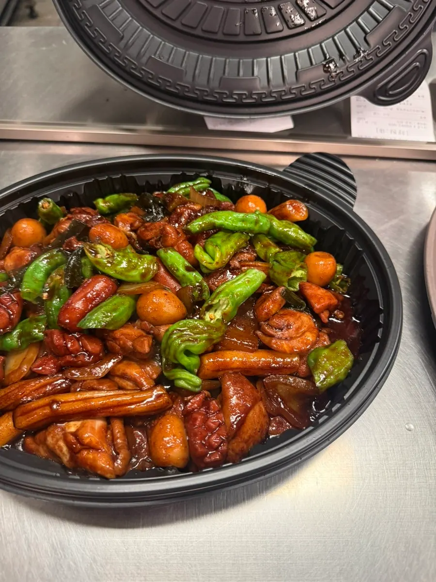 Chicken stir-fry with rice mixed into the seasoning