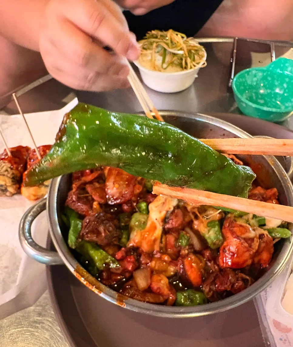 Boneless dakbokkeum served over rice
