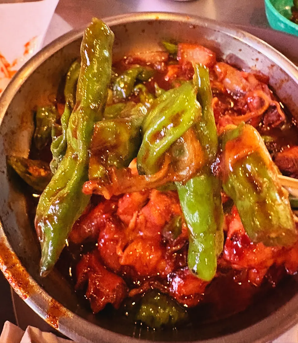 A skewer made from shishito peppers