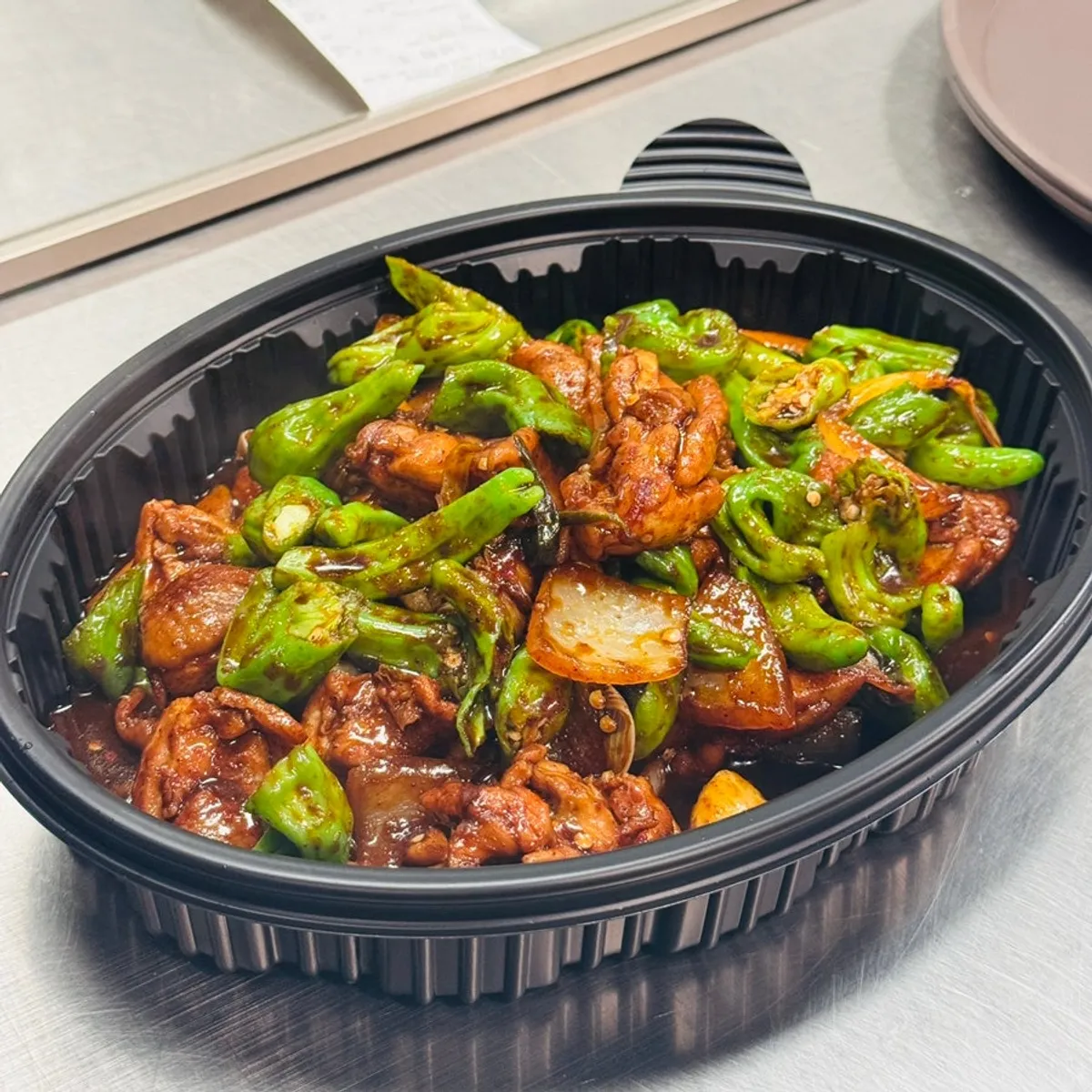 Sijang Dakbokkeum's signature shishito pepper dakbokkeum