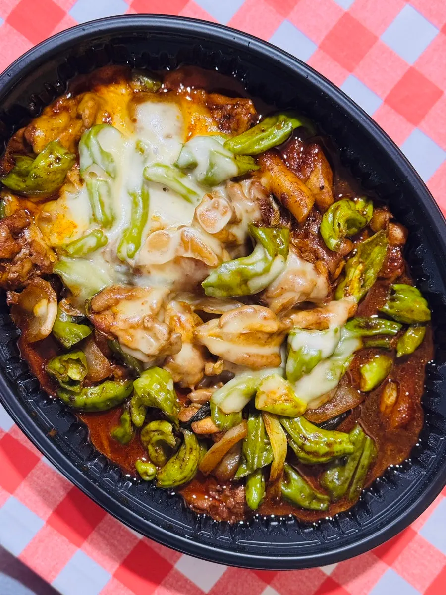 Spicy boneless dakbokkeum with stretchy melted cheese