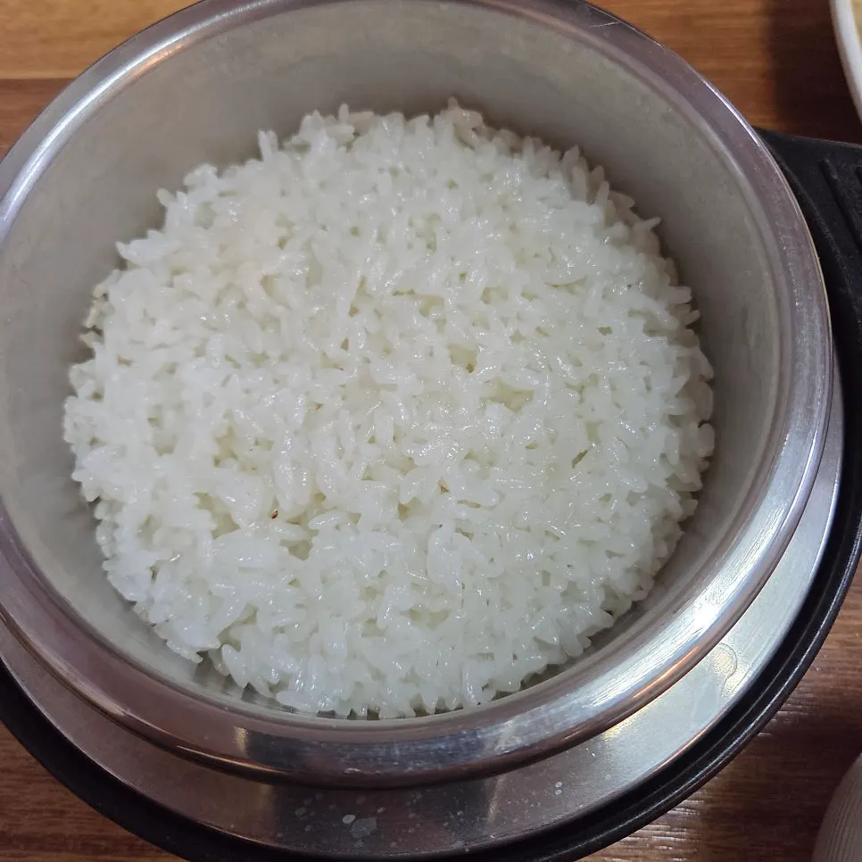 Cauldron rice scooped into a bowl