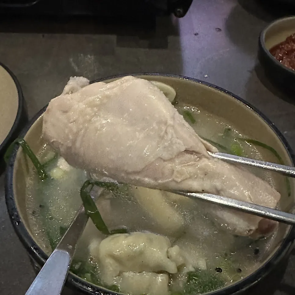 Dak han mari pot with added rice cake topping