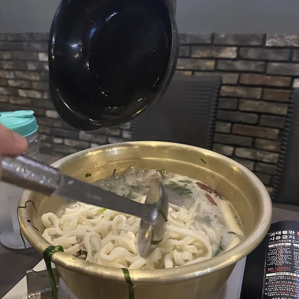 Kalguksu noodles simmered in the dak han mari broth