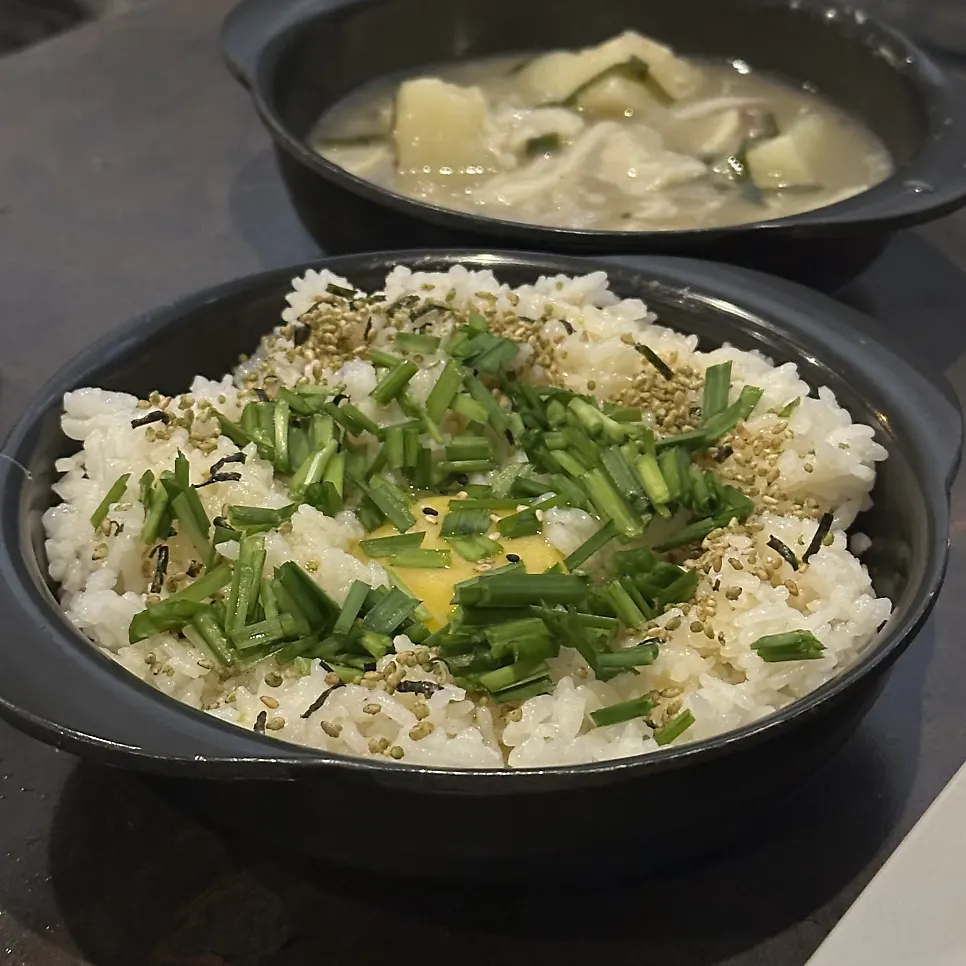 Chicken porridge finished with the dak han mari broth