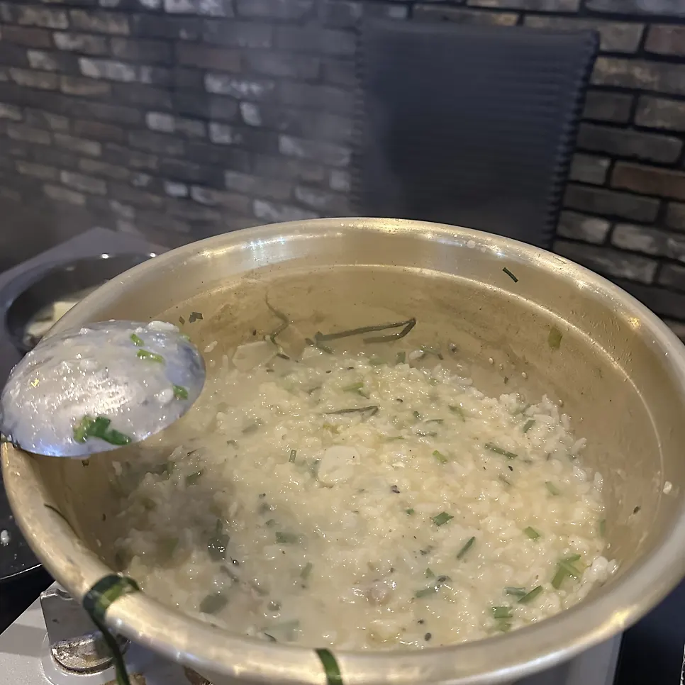 A rich bowl of finished chicken porridge