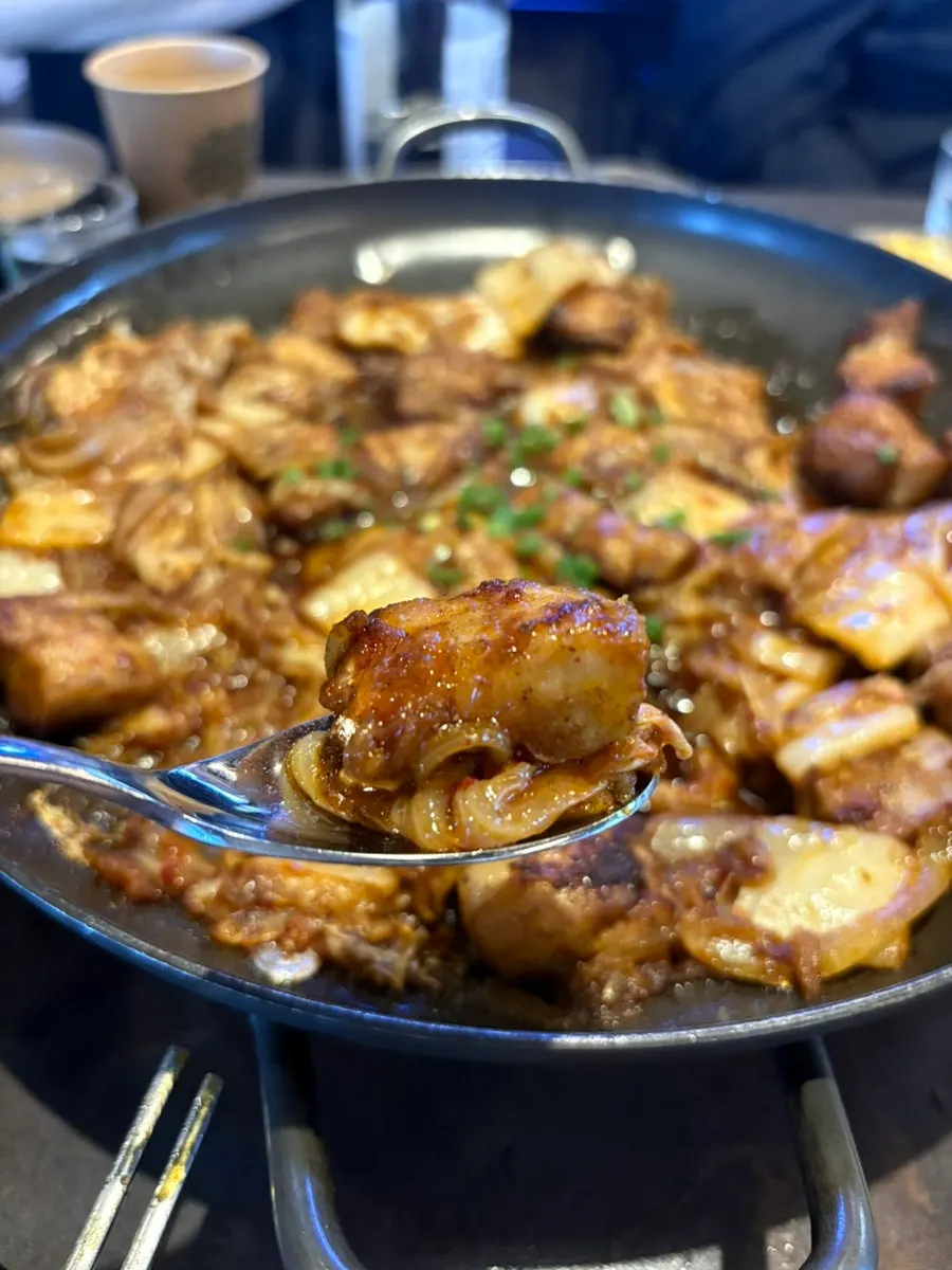 Thick pork belly and kimchi grilling together