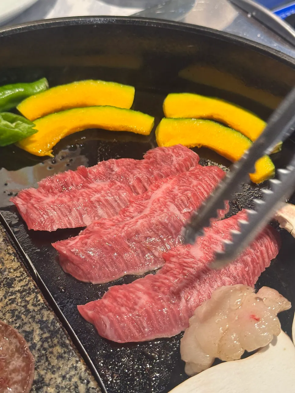 Neck chain and tri-tip on the grill