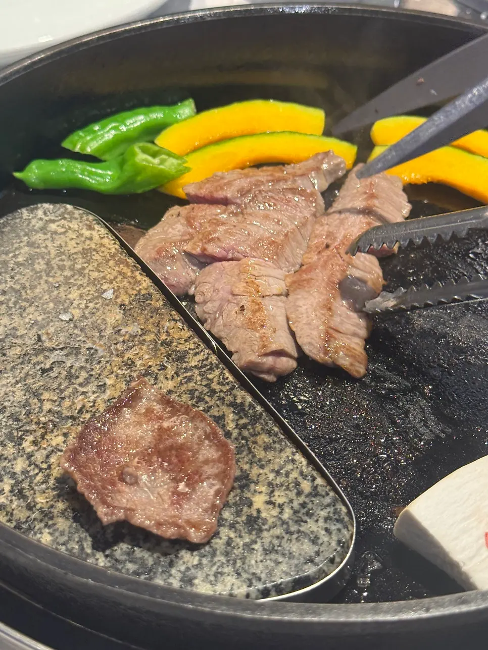 Grilled hanwoo served with side dishes