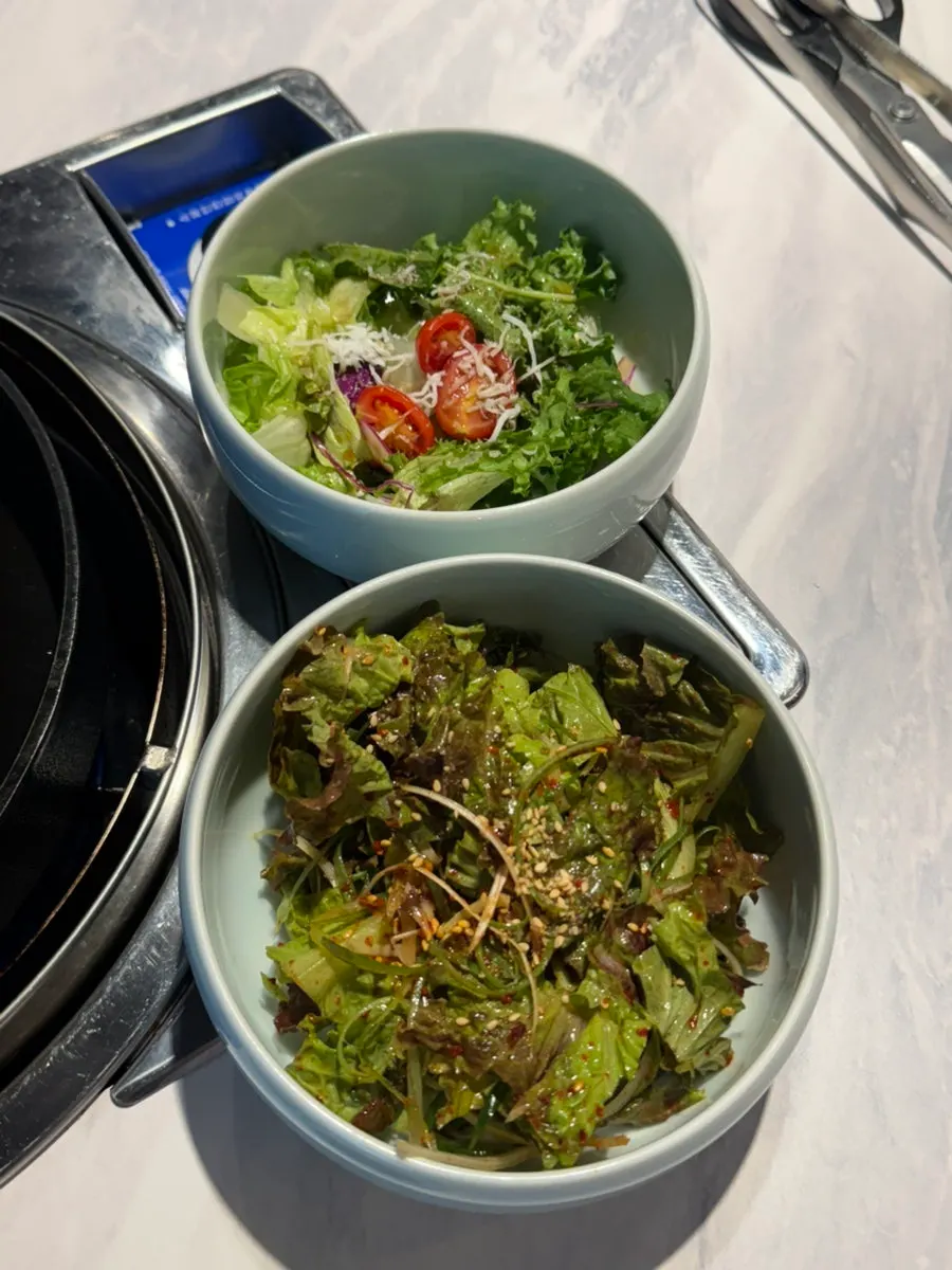 Side dishes and salad spread at Yong Hanu Namcheon Branch