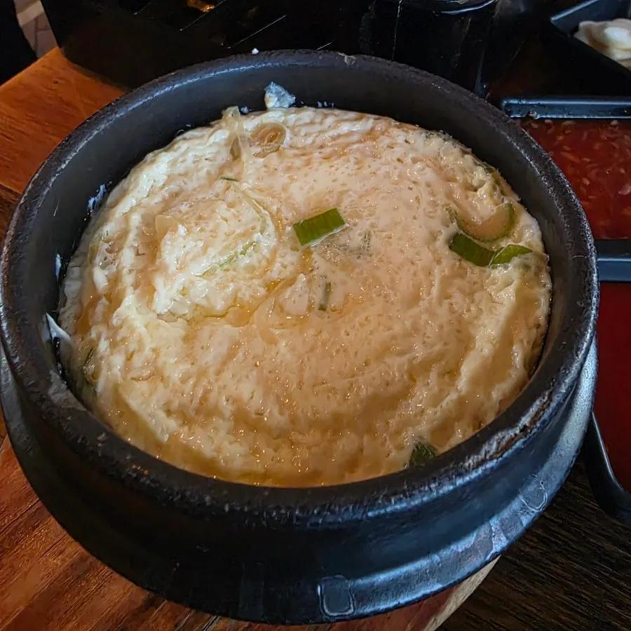 Steamed egg and fish cake soup included as basics