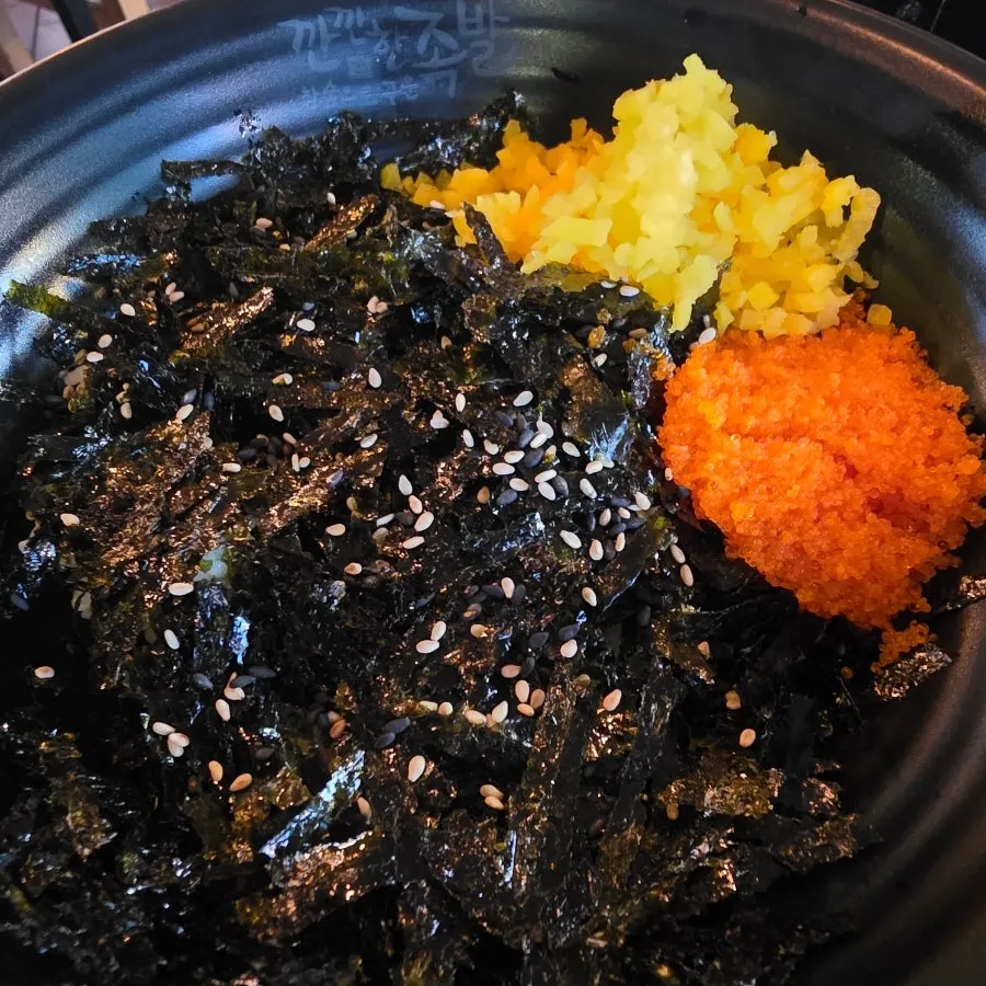A plate of flying fish roe rice balls