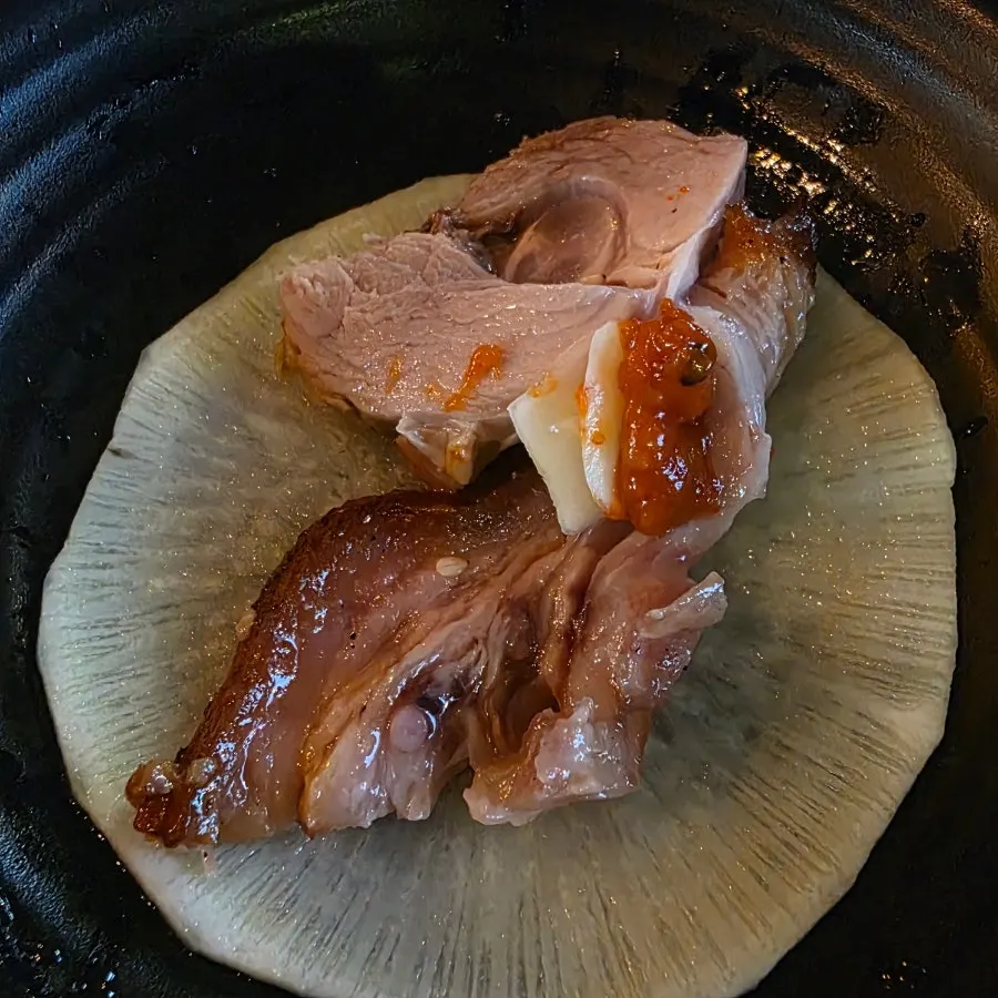 Charcoal-grilled jokbal served with side dishes