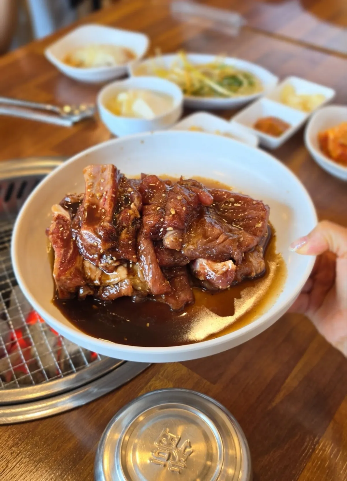 Signature photo of charcoal-grilled seasoned pork galbi at Yongchon Gogi-jip in Goseong