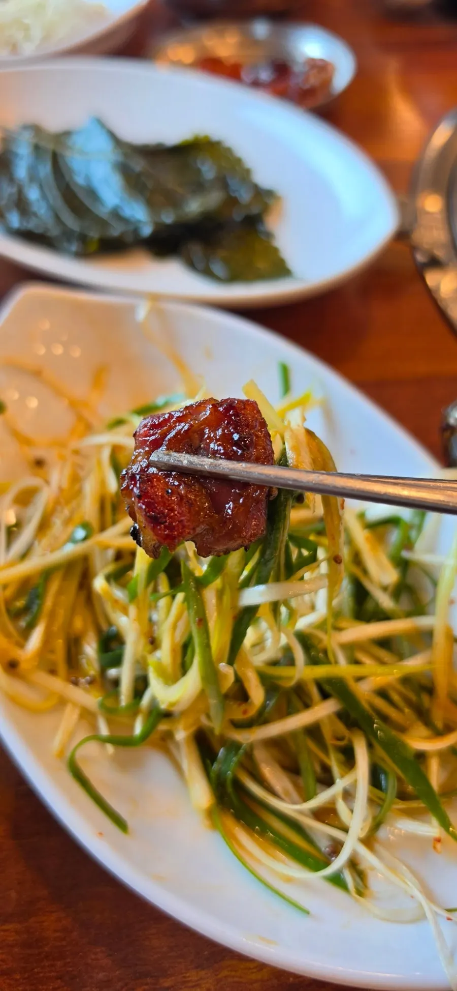 Seasoned pork galbi wrapped in pa-jeori