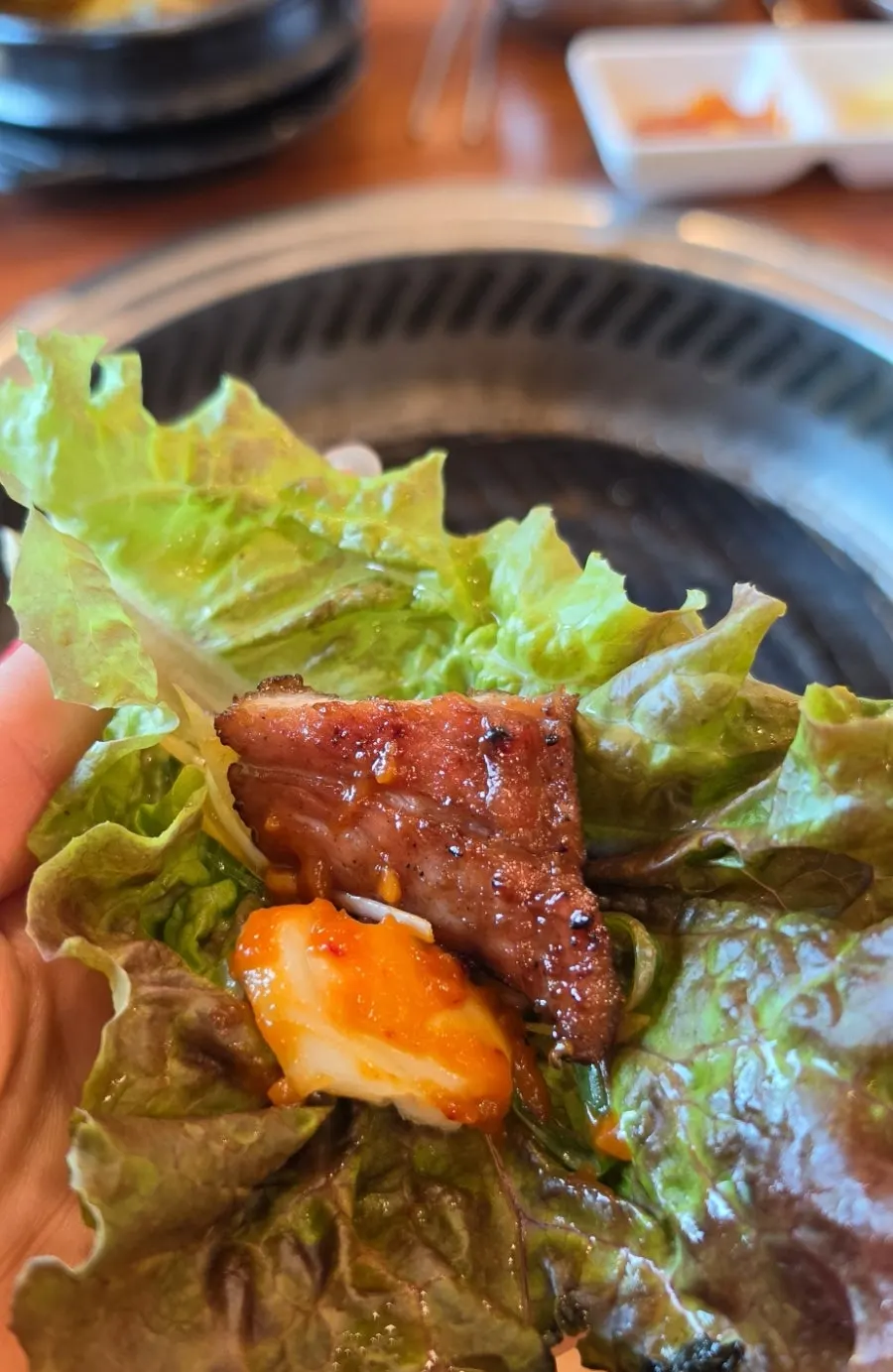 Pork galbi wrap with raw garlic added
