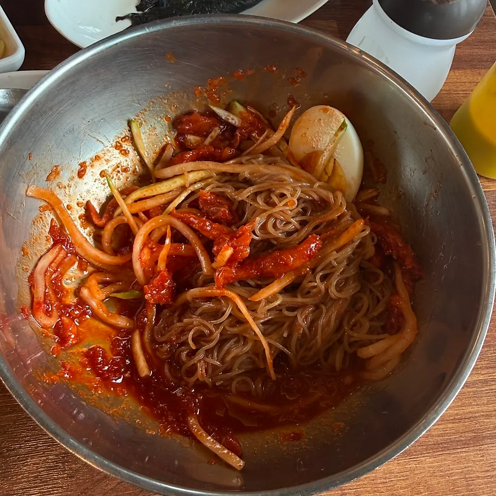 A thick piece of pollock hoe lifted with chopsticks