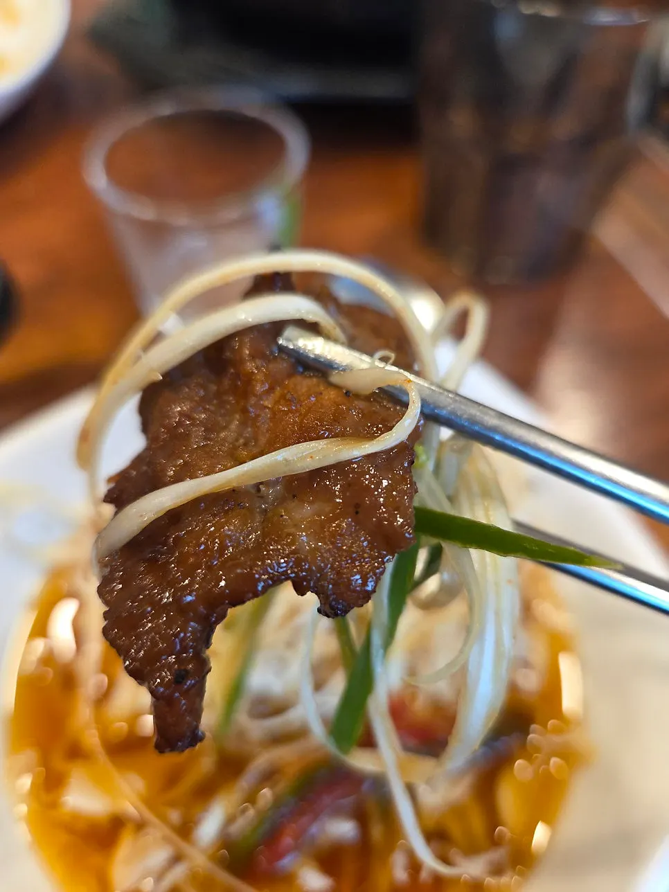 Marinated pork galbi grilling on charcoal