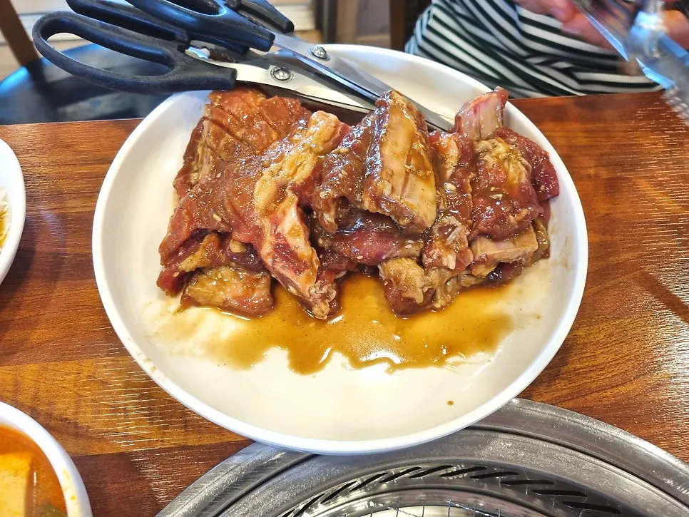 Plate with 3 servings of hand-butchered seasoned pork galbi